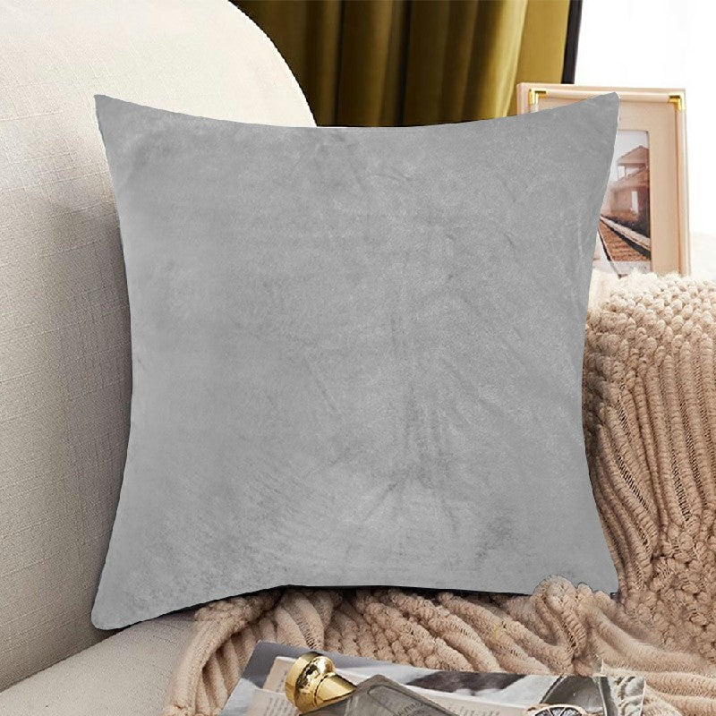 Light grey velvet cushion cover in a styled room; inserts and styling accessories not included